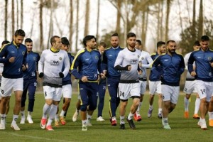 شعار قهرمانی روی سکوهای باغ فردوس